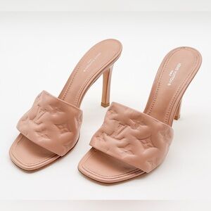 Louis Vuitton Revival Mule Heel Sandals Beige
Monogram Embossed Leather EU 38